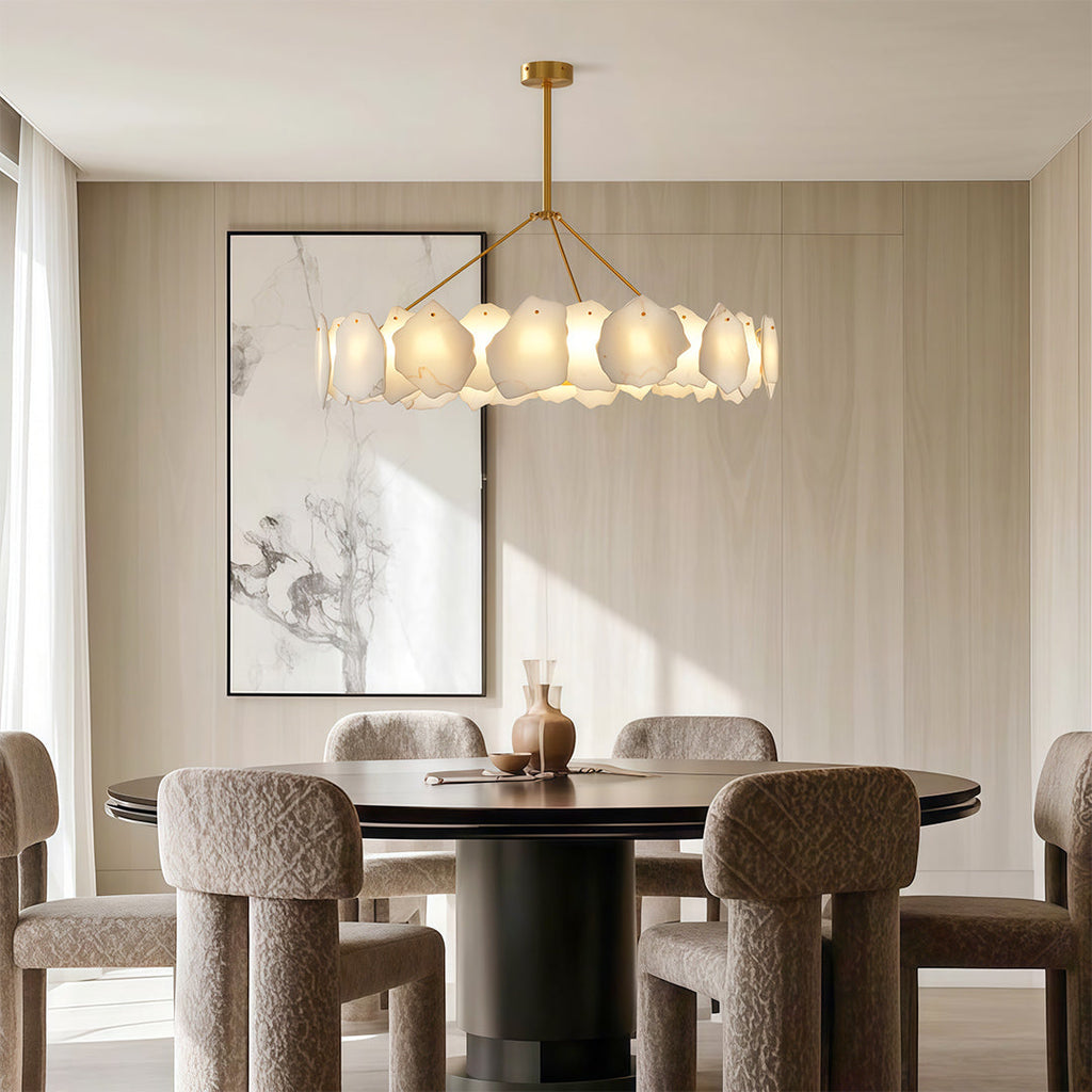 Modern luxury chandeliers featuring brushed nickel with layered frosted glass panel configuration