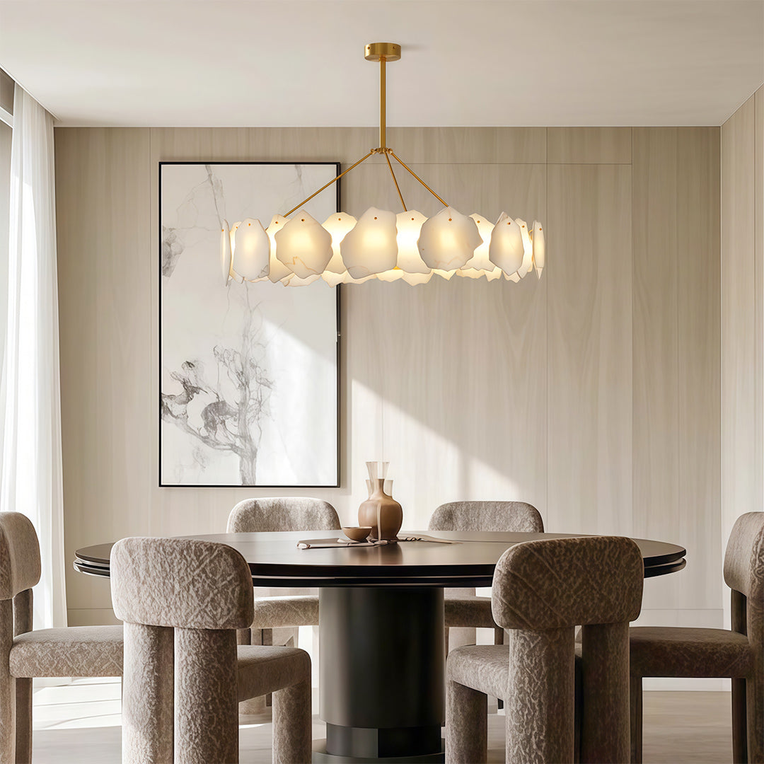 Modern luxury chandeliers featuring brushed nickel with layered frosted glass panel configuration