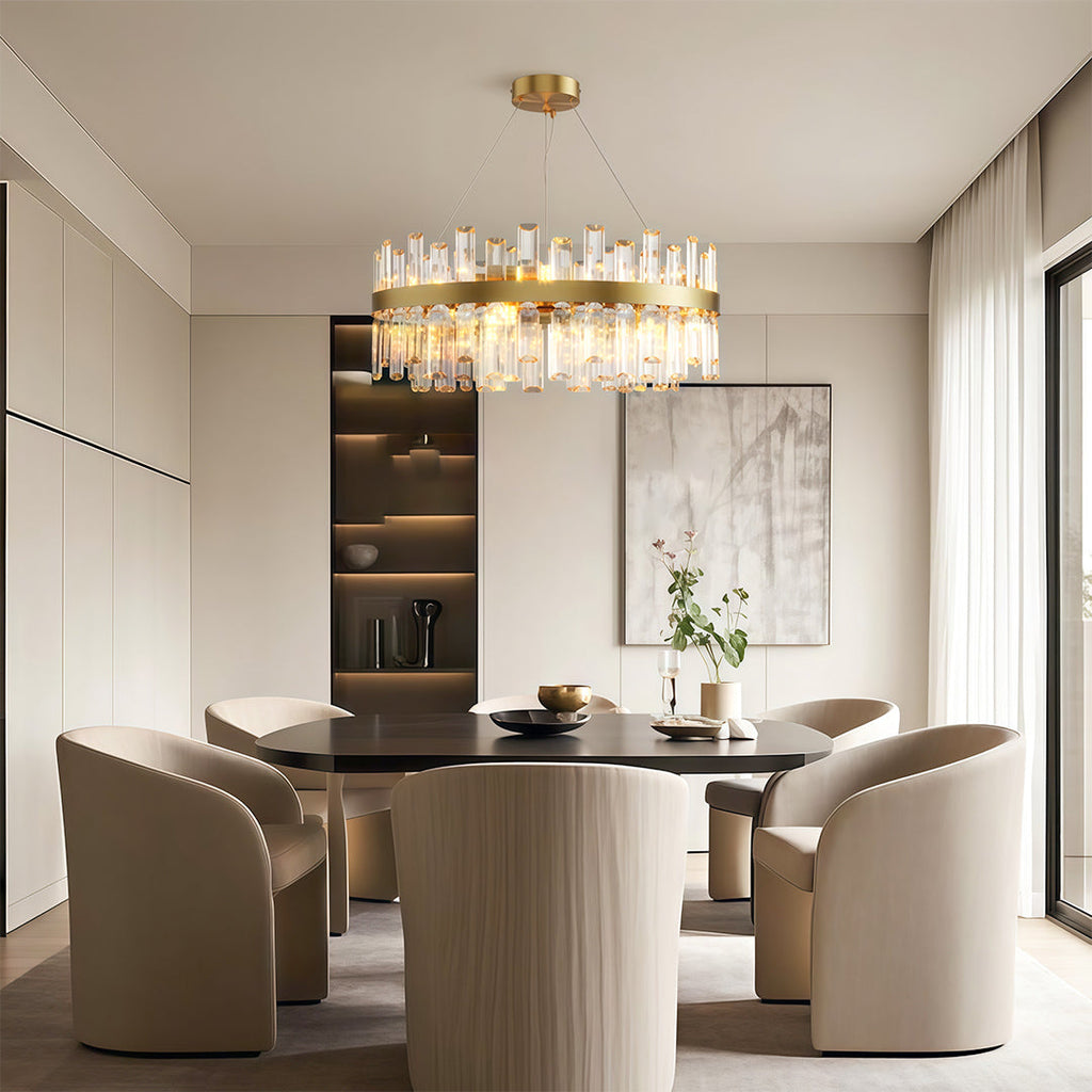 Modern luxury chandeliers illuminating elegant dining room with built-in shelving and round table