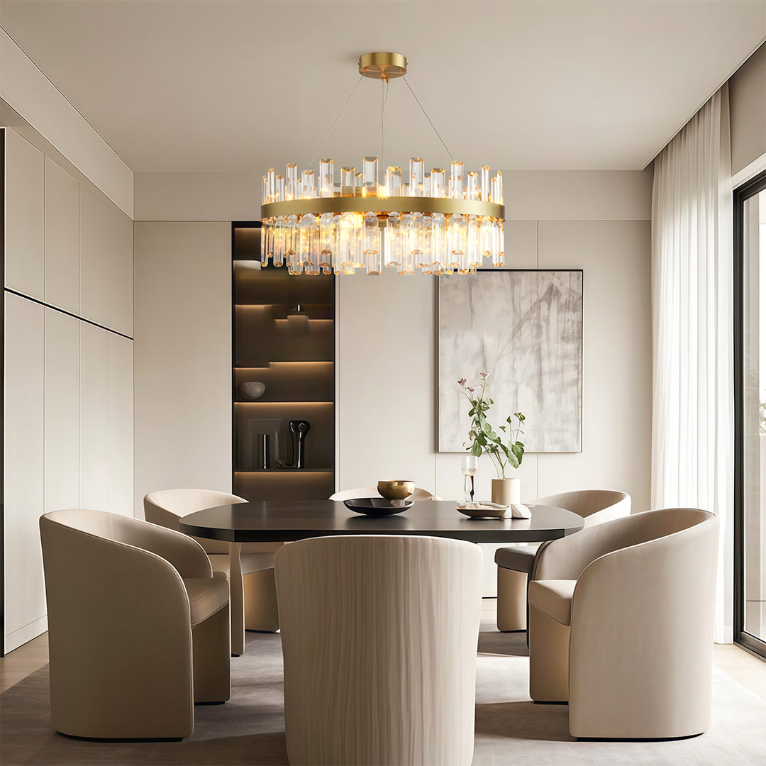 Modern luxury chandeliers illuminating elegant dining room with built-in shelving and round table