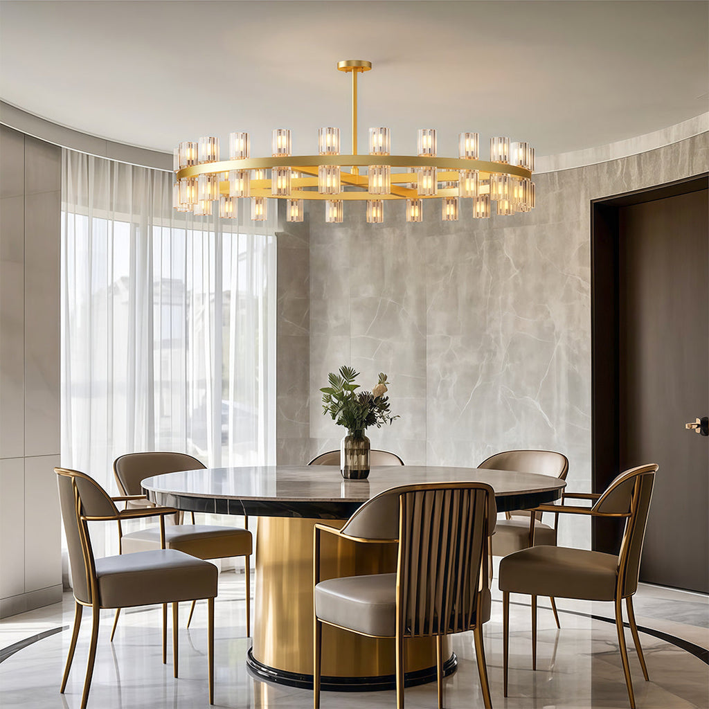 Modern luxury chandeliers lighting elegant dining area with fluted wood table base