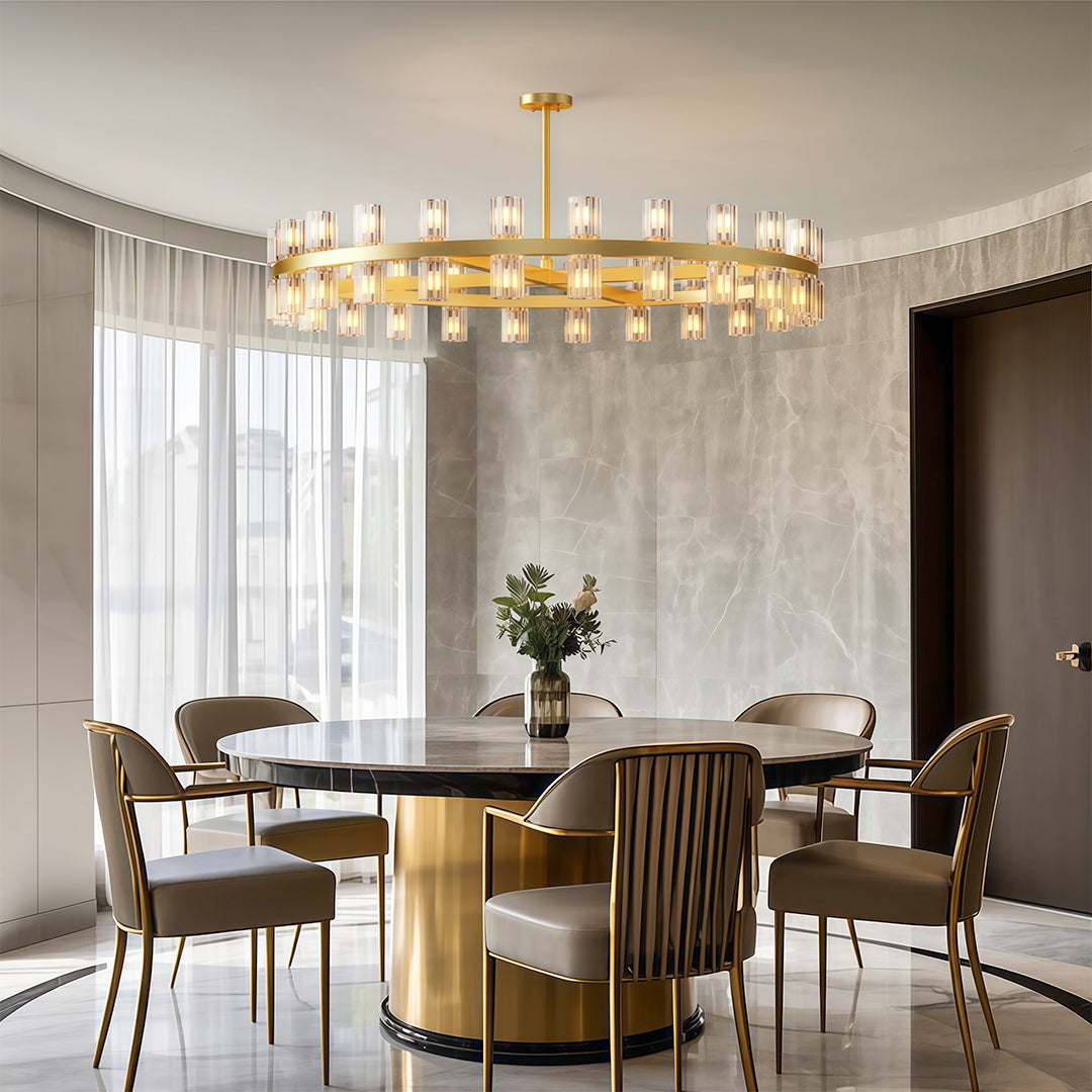Modern luxury chandeliers lighting elegant dining area with fluted wood table base