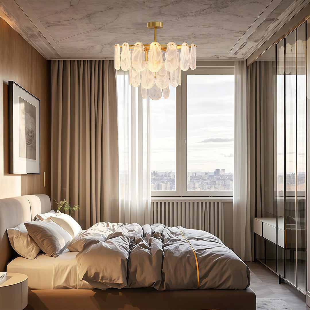 Midcentury modern chandelier above circular dining table in warm contemporary interior