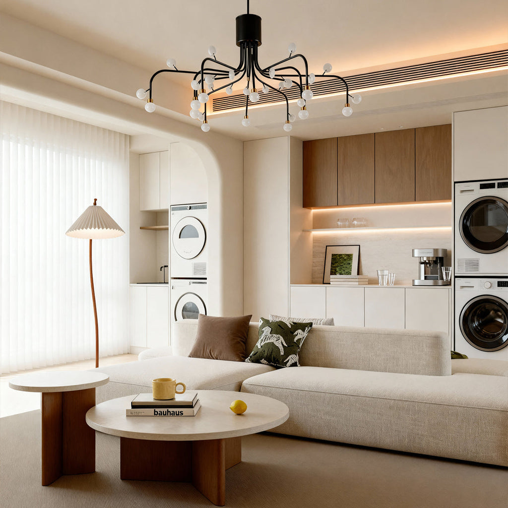 Modern retro chandelier illuminating contemporary living room with neutral sofa and minimalist decor creating warm ambiance