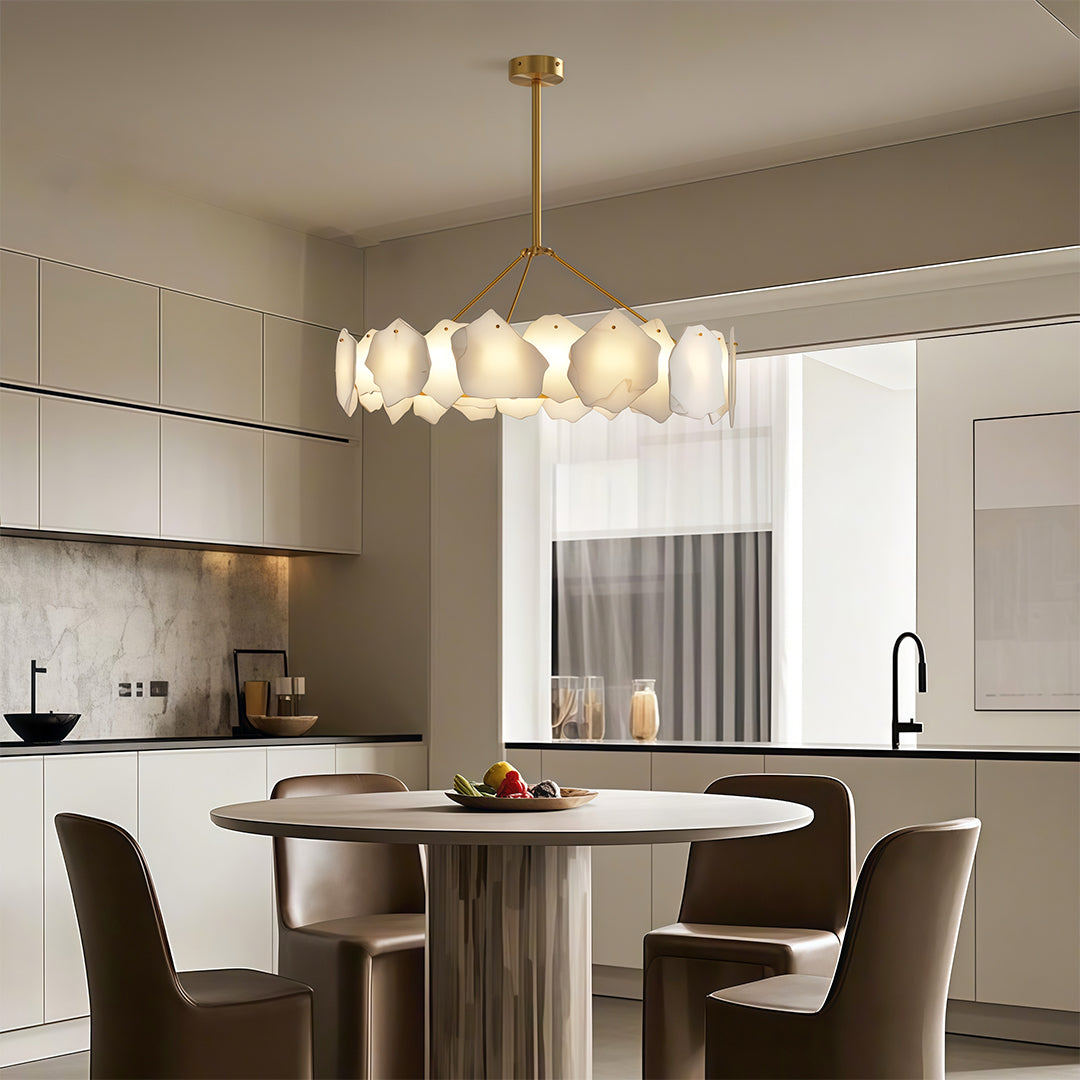 Wall art light fixtures creating ambient lighting in sleek dining space with integrated cabinetry