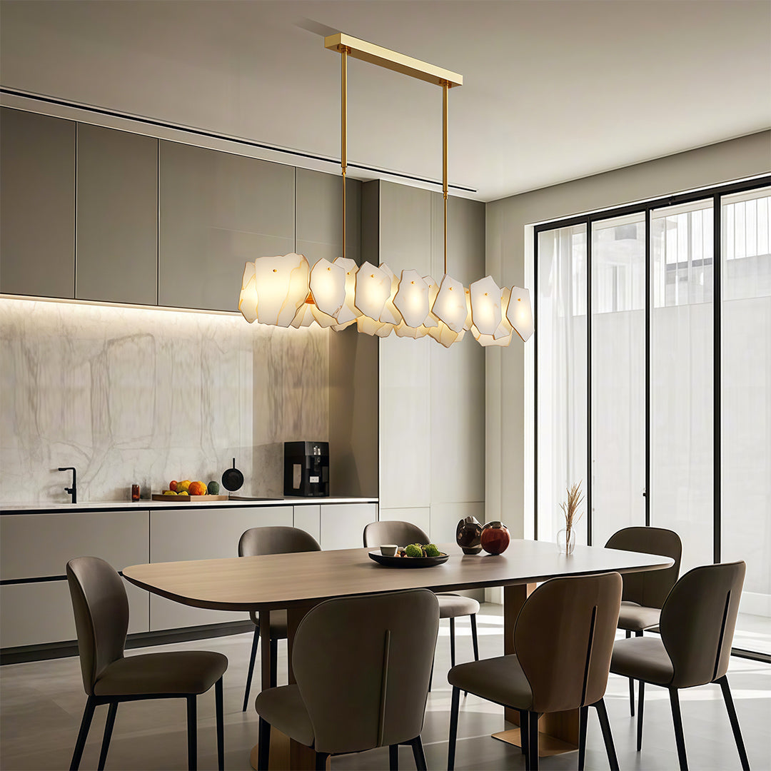 Modern luxury chandeliers enhancing contemporary dining room with architectural ceiling detail
