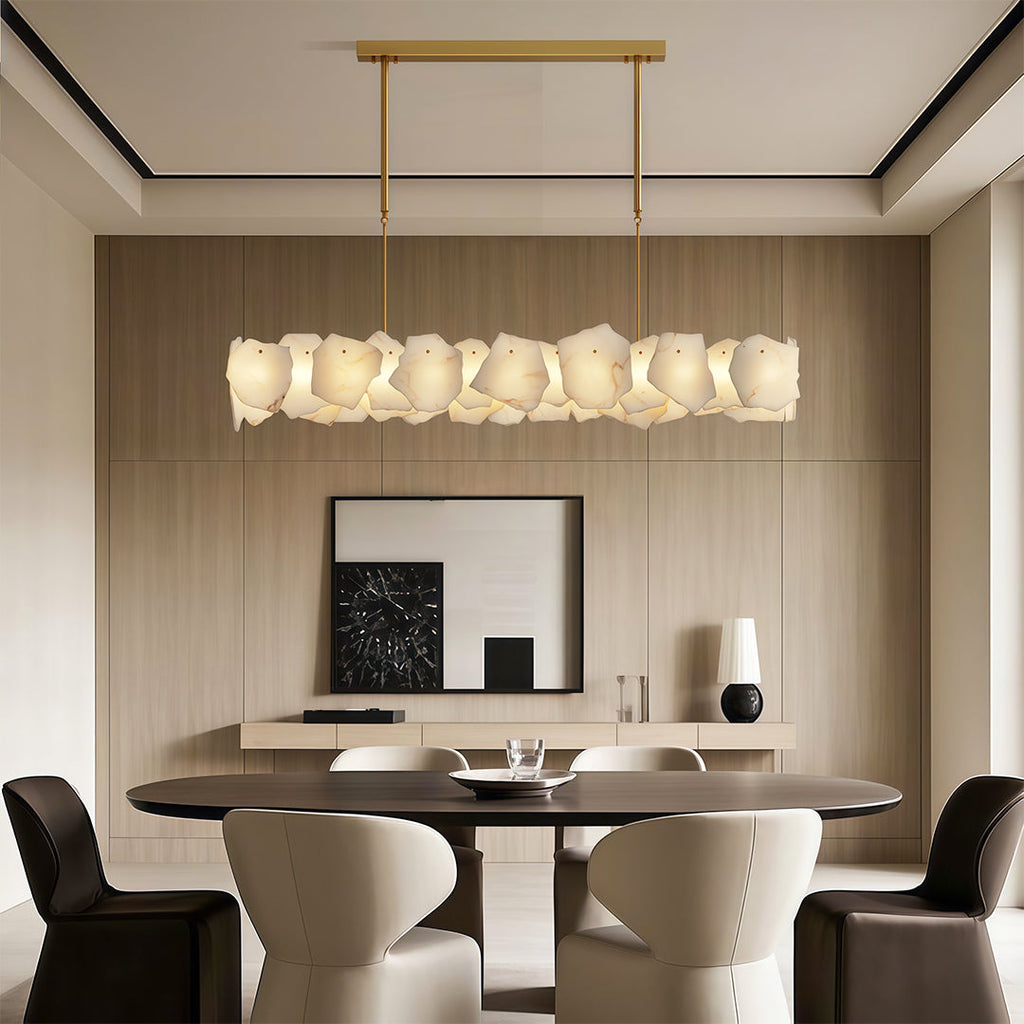 Wall art light fixtures enhancing modern dining room with geometric rug and statement lighting